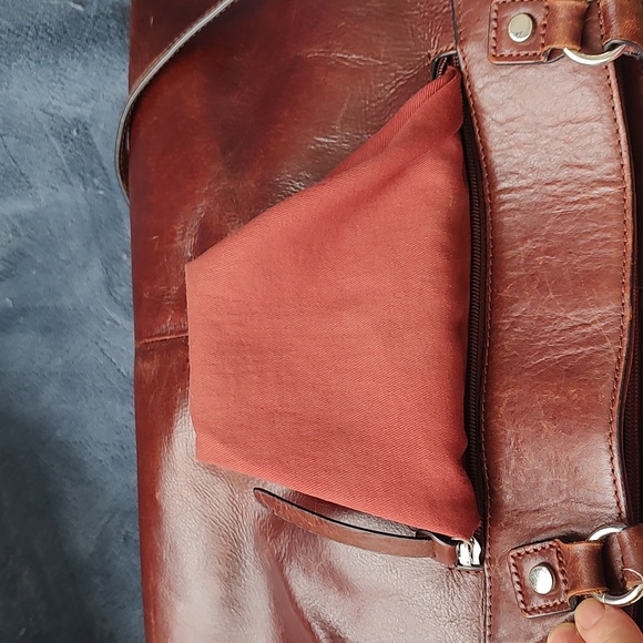 Wilsons Leather brown cognac large briefcase crossbody. Good used condition. - Picture 9 of 16